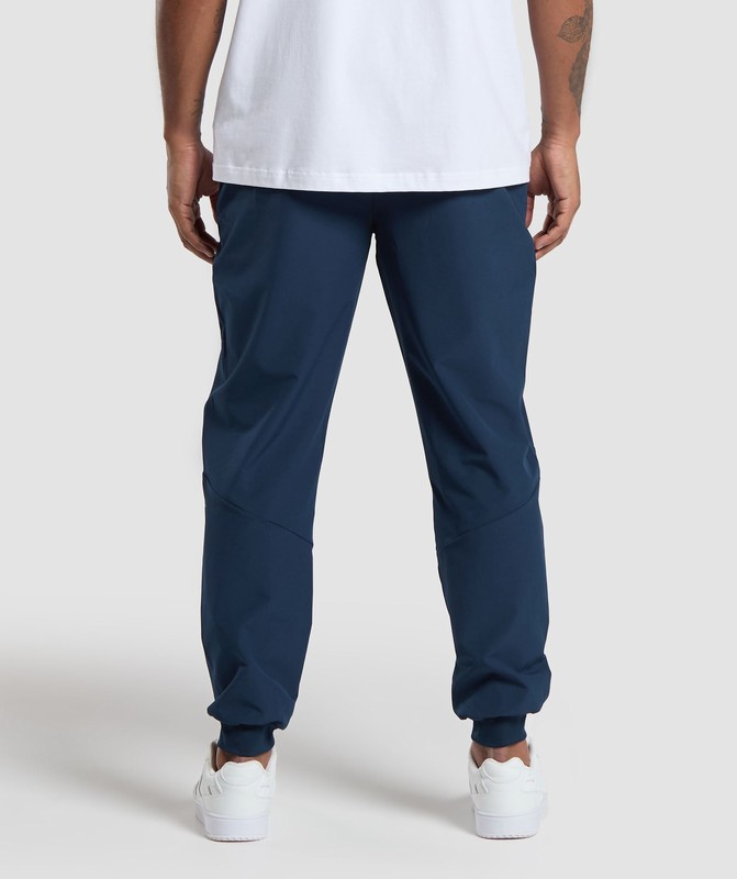 Gymshark Ease Woven Jogger Joggingbyxor Herr Marinblå | 870LBGWFZ
