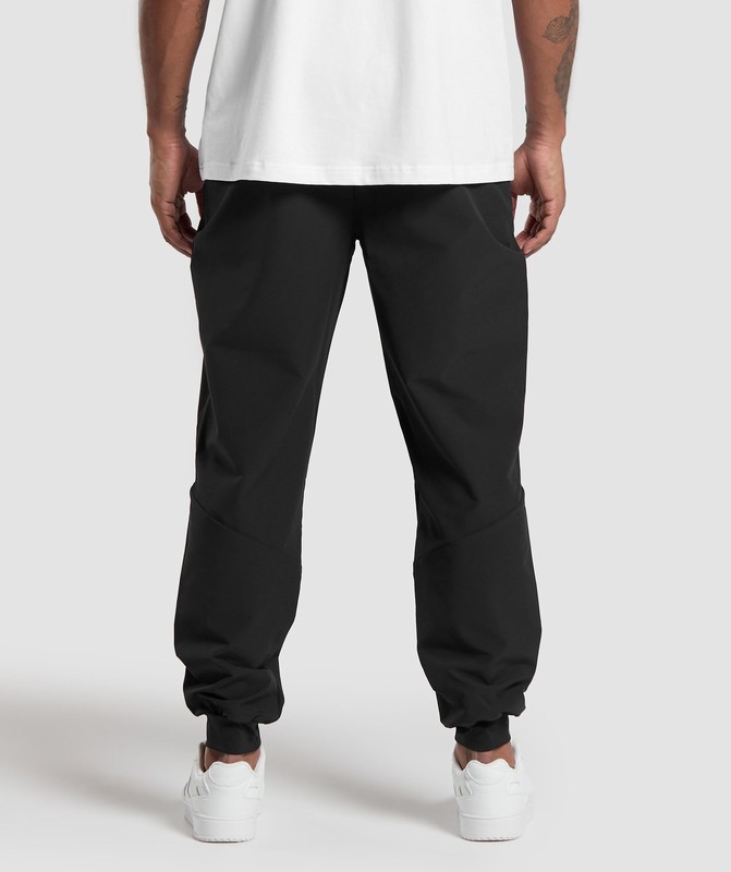 Gymshark Ease Woven Joggers Joggingbyxor Herr Svarta | 904DJCFEK