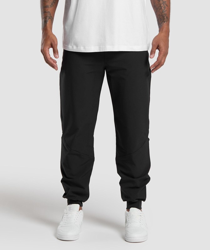 Gymshark Ease Woven Joggers Joggingbyxor Herr Svarta | 904DJCFEK